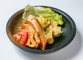 chicken Toriham Potato salad with fresh greens and tomato, beautifully presented. Perfect for healthy meal promotions, culinary blogs, or restaurant menus.