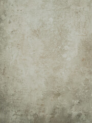Textured beige stoneware surface resembling aged concrete or stone tile, ideal for backgrounds, interior design, or material samples