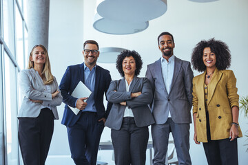 Diverse Business Team Standing Together in a Modern Office, Confident Professionals, Smiling Colleagues