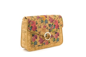 Colorful motif cork handbag with rounded, elegant form.