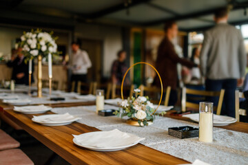 Elegant dinner setup in a beautifully decorated venue for a special event gathering