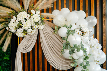 Beautiful wedding decoration with flowers and balloons for a romantic ceremony