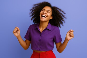 young woman with curly hair and glowing skin laughs joyfully against a soft periwinkle backdrop