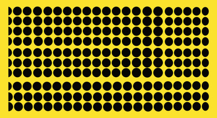 Black circles in a grid on a yellow background