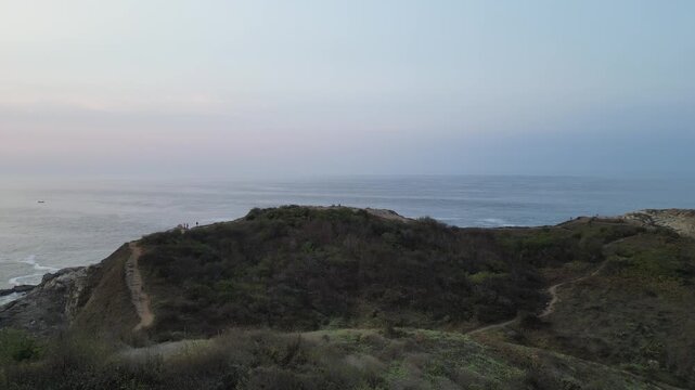 Sweeping Panorama of a Remote Mountain Ridge Next to the Ocean on Punta Cometa in Mazunte Mexico