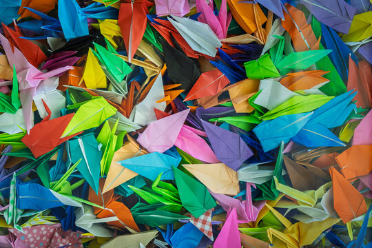Background of Origami paper cranes, symbol of peace in Peace Memorial Hall for the Atomic Bomb Victims in Nagasaki in Japan