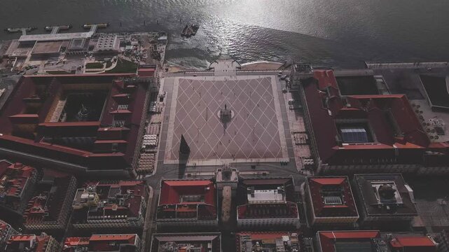 Aerial view of the geometric patterns on the Praca do Comercio square, with buildings around it, Lisbon, Lisbon, Portugal.