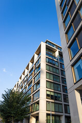 Low angle view of contemporary urban architecture and city skyline