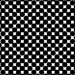 Bold graphic pattern featuring black polka dots on white backdrop creating a stylish modern design perfect for backgrounds, textiles, or creative projects