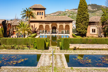 Ladies tower of Alhambra palace and gardens of Partal, Granada, Spain