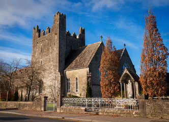 The Holy Trinity Abbey, also known as the White Monastery, founded in 1230, the Roman Catholic parish church in the centre of Adare Village, County Limerick, Ireland.
