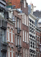 Amsterdam Molensteeg Street View with Old Dutch House Facades and Festive Lights, Netherlands