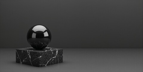 Black marble pedestal with glossy sphere on dark background  with copy space