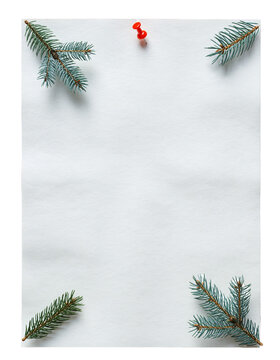 Clean white paper with red pin and New Year pine branches in all four corners