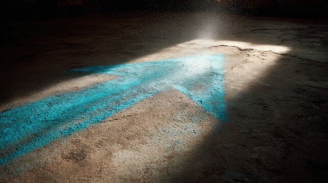 Blue arrow on concrete floor with dramatic lighting for directional design concept,Commitment Day