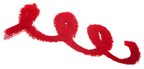 Smear of red lipstick texture paint isolated on a white background, top view. Beauty and make up...