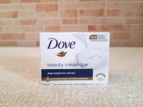 London, England - July 04, 2025: A bar of Dove soap is located on the soap box. 
