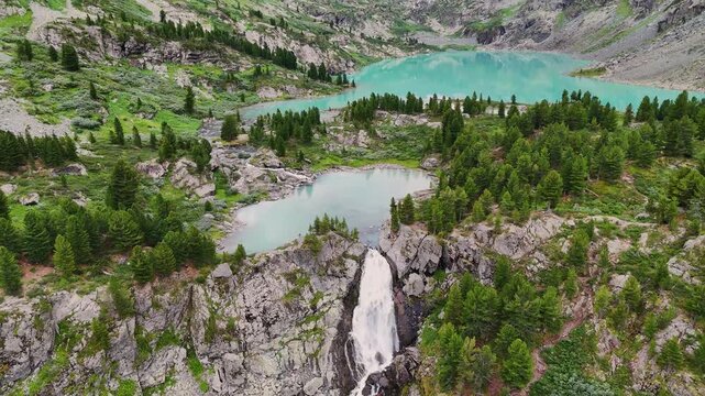 Kuyguk Mountain Lake is turquoise in color, as seen from a drone