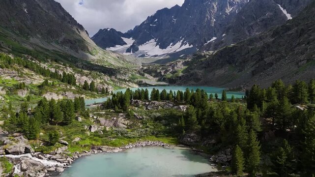 Kuyguk Mountain Lake is turquoise in color, as seen from a drone
