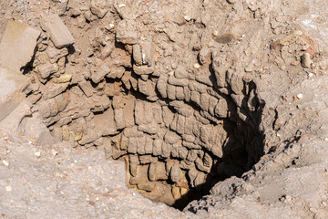 Excavation site revealing ancient well in Uruk Iraq showcasing historical significance