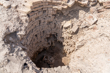 Excavation site revealing ancient well in Uruk Iraq showcasing historical significance
