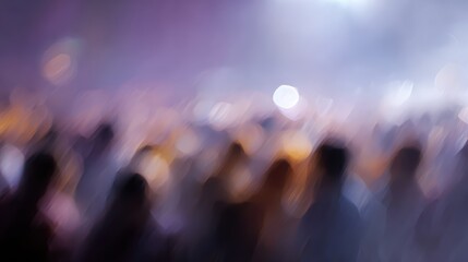 Blurred vibrant crowd enjoying a music performance