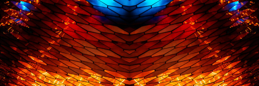 abstract, geometric wall made of hexagonal, glass-like tiles. The tiles reflect colorful lights creating a vibrant, shimmering effect. The overall texture is sleek and modern, almost cosmic aesthetic - Powered by Adobe