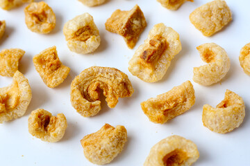 Crispy pork cracklings, a crunchy savory snack.