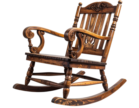 Ornate dark wood rocking chair against a black background