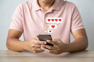 Person holding a smartphone with social media hearts and likes appearing from the screen