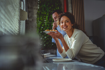 Woman holding homemade food for her partner