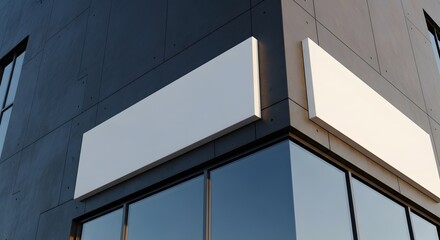 Obraz premium Modern Building Corner with Blank White Mockup Signs perfect for Branding mockup, website banner, marketing material, advertisement design, business