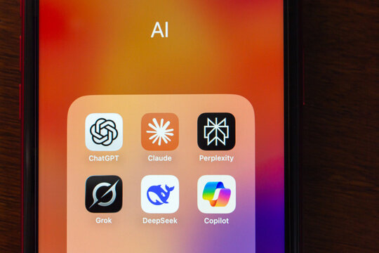 Quito, ECUADOR - Oct 6 2025 : Smartphone showing popular AI assistant apps including ChatGPT, Claude, Perplexity, Grok, DeepSeek and Copilot, highlighting modern AI tools for productivity and research