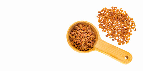 Natural aromatic fenugreek seeds in the measuring spoon - Natural food