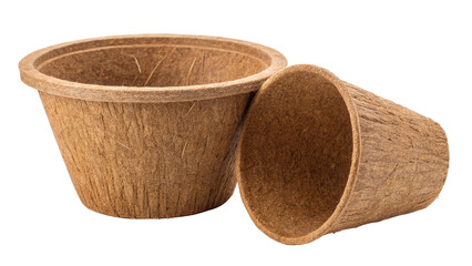 Photo of two empty biodegradable coir fiber planting pots, one upright and one tipped over, isolated on transparent background
