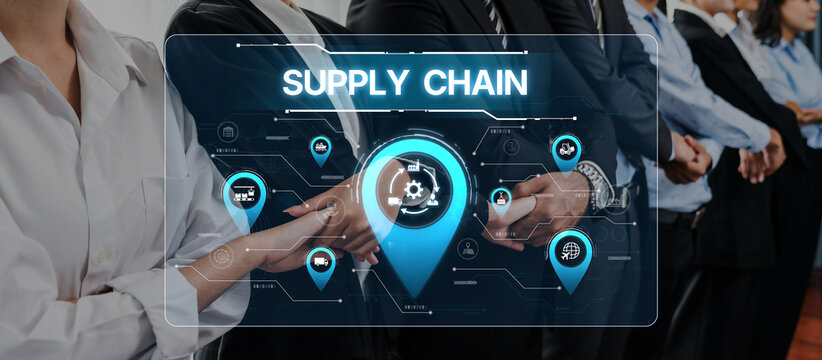 Business professionals collaboratively explore supply chain management with a digital interface, emphasizing teamwork and innovation in logistics and workflow efficiency. Trope - Powered by Adobe