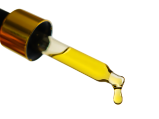 Dropper with yellow liquid falling isolated on transparent background