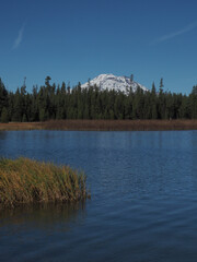 South Sister in the Cascade Mountains viewed from Little Lava Lake on a sunny fall day.
