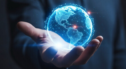 Human hand cradling a luminous, interconnected digital Earth sphere, symbolizing global technology, network connectivity, and future innovation in a dark, abstract setting