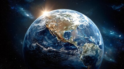 Earth is seen from space with a bright sunburst rising over the horizon, illuminating north america on the blue planet, surrounded by nebulae and stars in the cosmos