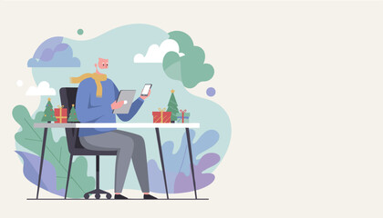 Senior man shopping online for Christmas gifts using tablet and phone at his desk