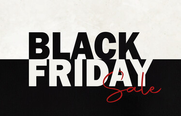 Black Friday words written on a piece of paper With the word 