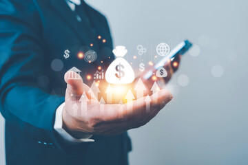 Businessman calculating ROI and analyzing investment performance, interest rate, dividend, profit growth, and financial planning. Concept of finance, money management, economic strategy, and business.