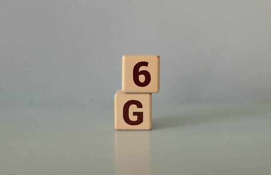 Displaying transparent Earth globe overlay and 6G text occupying center at lakeside, with red canoe.