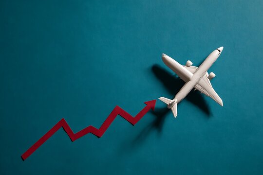 Exciting airline industry growth illustrated with a toy airplane soaring above a rising red arrow, symbolizing travel industry success and financial progress - Powered by Adobe