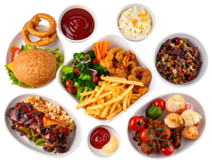 A variety of fast food dishes including a burger, fried chicken, fries, onion rings, salads, and side bowls of sauces and desserts arranged on a table