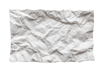 Crinkled white paper scrap on a contrasting black background