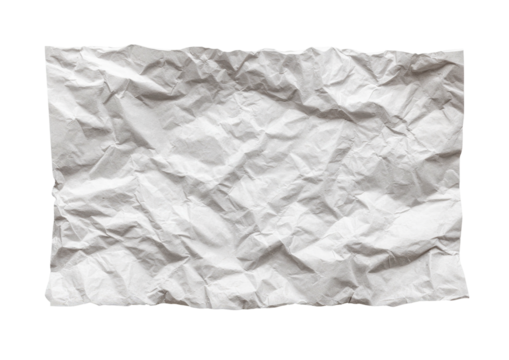 Crinkled white paper scrap on a contrasting black background