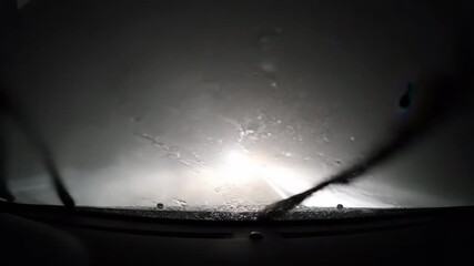 Eerie night driving POV with atmospheric fog revealing ghostly figure - Powered by Adobe
