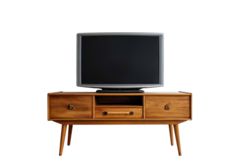 TV on wooden mid-century cabinet against black backdrop
